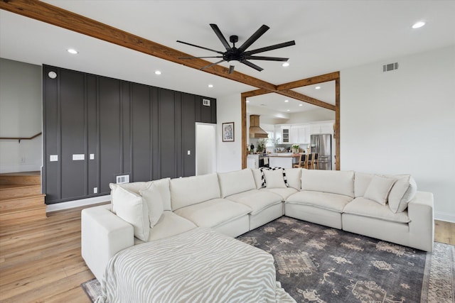 1513 Paris Ave, Swainsboro, GA 30401 - living area with light wood-type flooring, ceiling fan, recessed lighting, and stairway