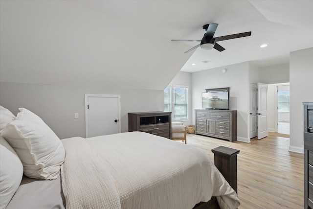 1513 Paris Ave, Swainsboro, GA 30401 - bedroom featuring light wood-style floors, multiple windows, ceiling fan, recessed lighting, and vaulted ceiling