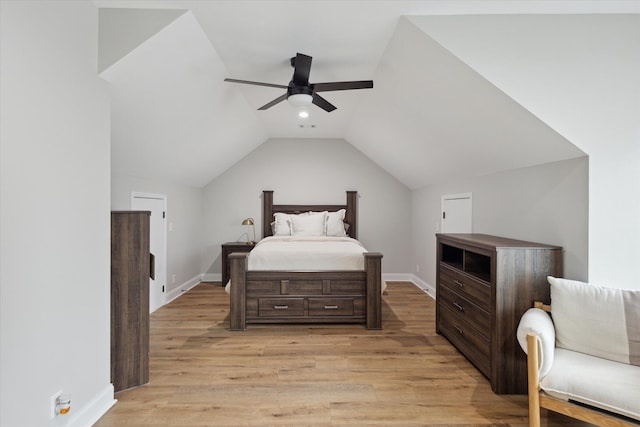 1513 Paris Ave, Swainsboro, GA 30401 - bedroom with light wood-style flooring, vaulted ceiling, and ceiling fan