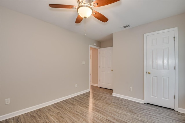 1907 Lobelia Ln, Augusta, GA 30906 - unfurnished bedroom featuring wood finished floors, baseboards, and ceiling fan