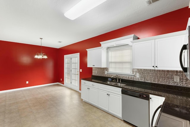 kitchen with sink, white cabinets, an inviting chandelier, and dishwasher