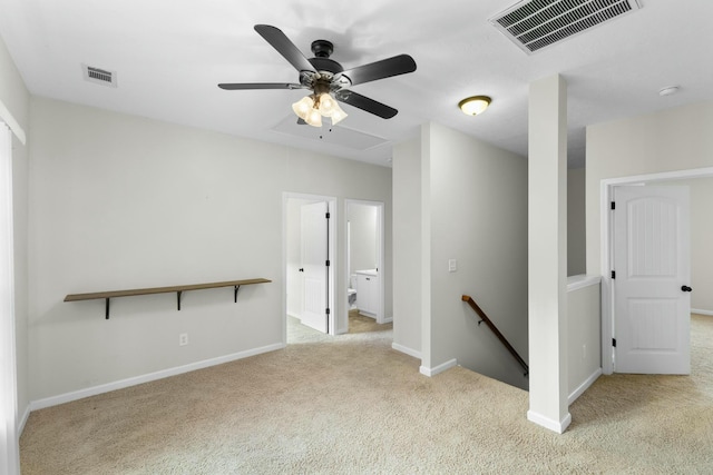 unfurnished room with light colored carpet