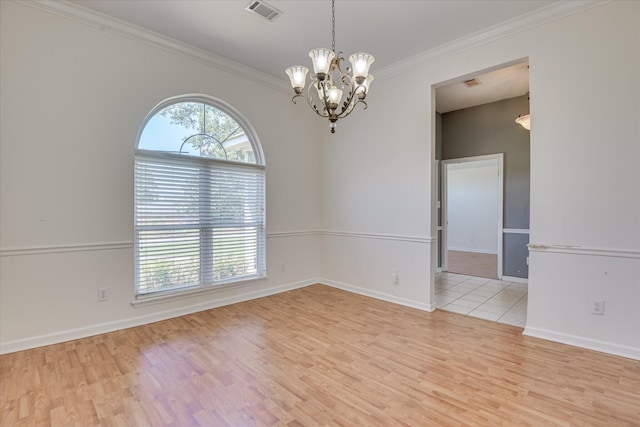 4506 Marthas Way, Grovetown, GA 30813 - empty room with crown molding, wood finished floors, and a chandelier