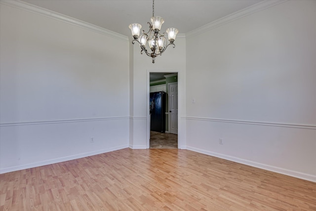 4506 Marthas Way, Grovetown, GA 30813 - spare room with light wood finished floors, crown molding, and a chandelier