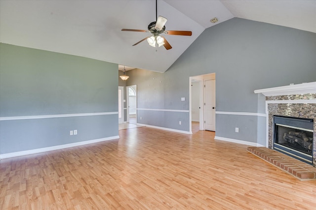 4506 Marthas Way, Grovetown, GA 30813 - unfurnished living room with a ceiling fan, high vaulted ceiling, wood finished floors, and a fireplace