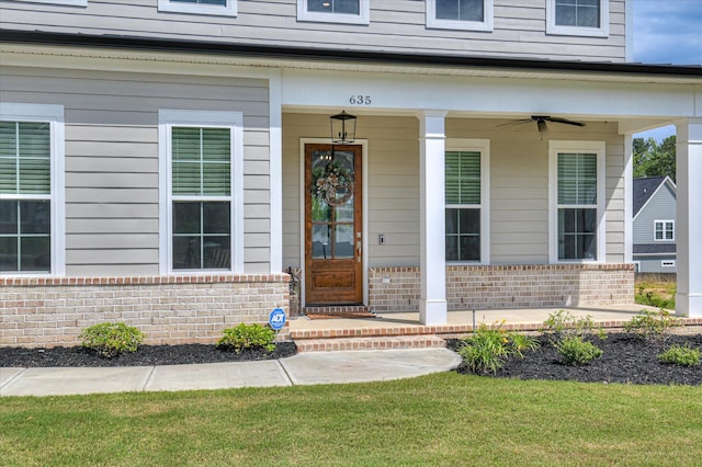 635 River Oaks Ln, Evans, GA 30809 - property entrance with brick siding, ceiling fan, and a porch