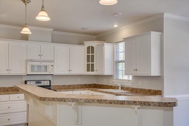 kitchen featuring stainless steel electric range oven, decorative light fixtures, ornamental molding, white cabinets, and sink