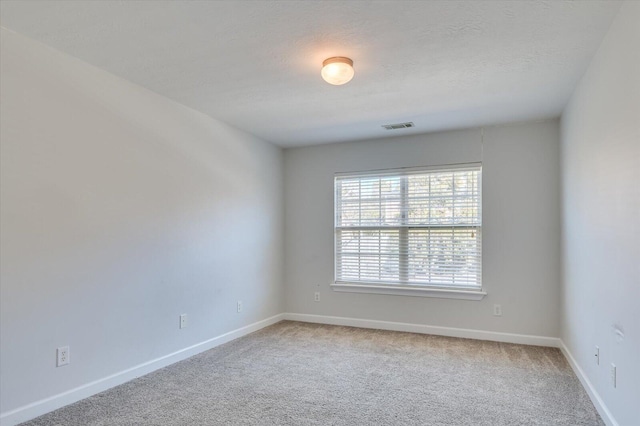 empty room with carpet floors