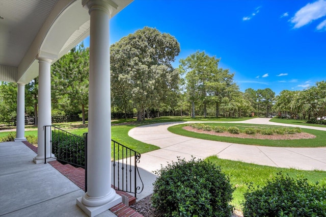 view of community featuring a lawn