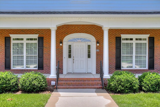 doorway to property featuring a porch