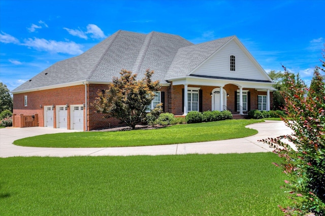 view of front facade with a front yard and covered porch