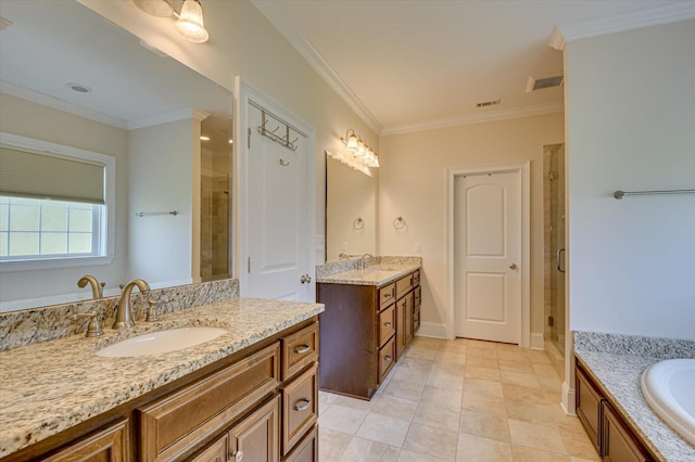 bathroom featuring tile patterned flooring, vanity, separate shower and tub, and ornamental molding