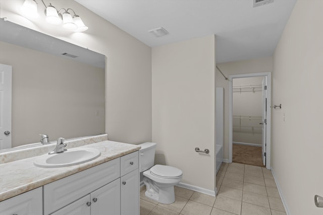 full bath with visible vents, toilet, vanity, and tile patterned floors