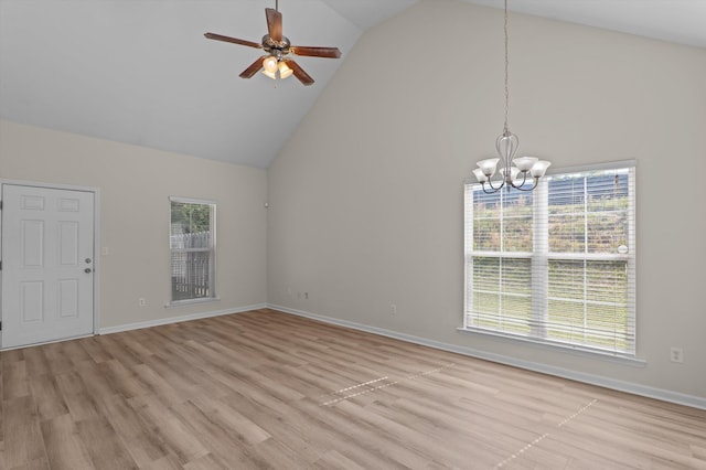 interior space featuring high vaulted ceiling, baseboards, light wood-style flooring, and ceiling fan with notable chandelier