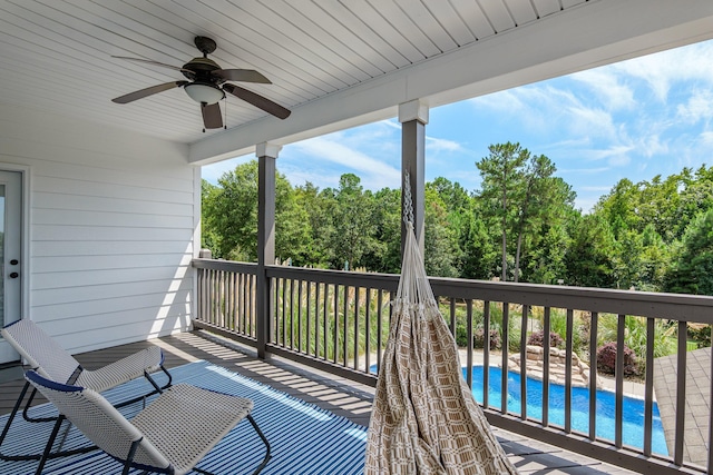 wooden deck with ceiling fan