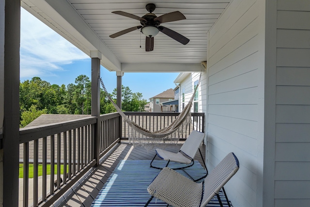 balcony featuring ceiling fan