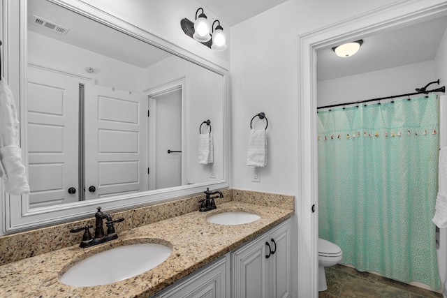 bathroom with a shower with curtain, vanity, and toilet