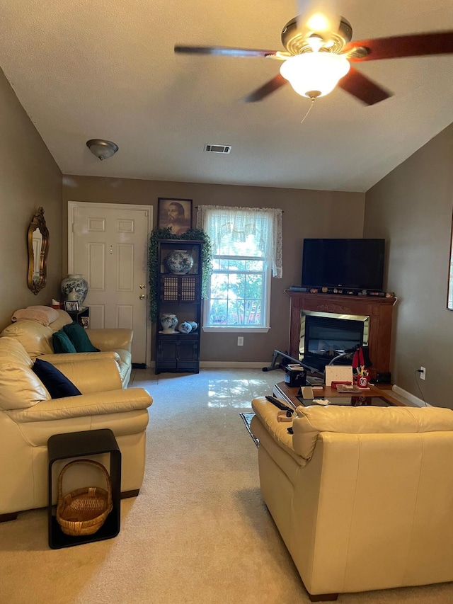 1036 Old Marks Dr, Augusta, GA 30909 - living room featuring ceiling fan, light carpet, and a glass covered fireplace