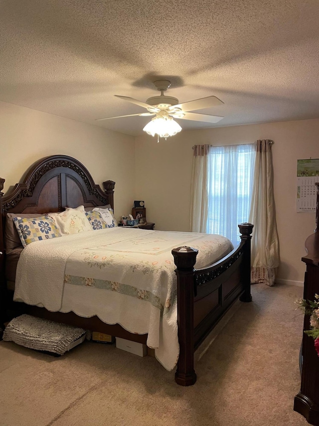 1036 Old Marks Dr, Augusta, GA 30909 - bedroom with light carpet, a textured ceiling, and a ceiling fan