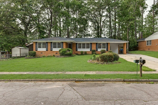 227 Chatham Rd, Augusta, GA 30907 - single story home with concrete driveway, crawl space, brick siding, and a carport