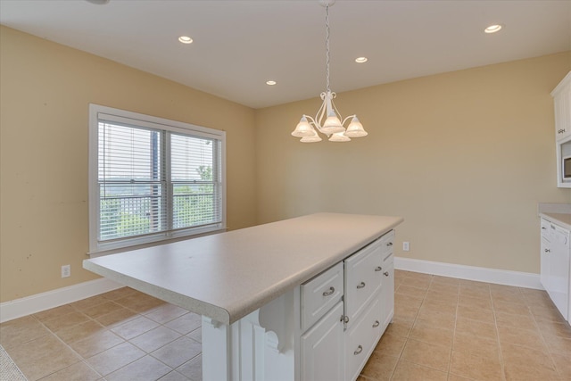 kitchen featuring a chandelier, light countertops, light tile patterned flooring, recessed lighting, and white cabinets
