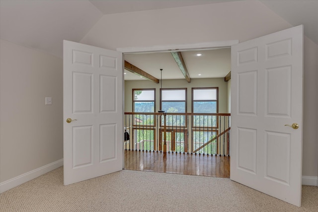 carpeted empty room featuring baseboards and recessed lighting