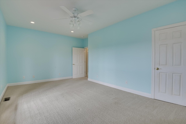 spare room featuring carpet flooring, ceiling fan, baseboards, and recessed lighting