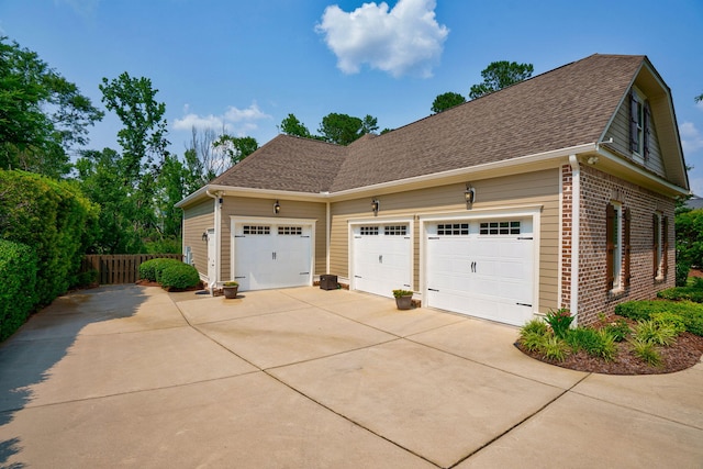 3820 Blue Springs Trce, Evans, GA 30809 - view of property exterior featuring concrete driveway, brick siding, roof with shingles, and a garage