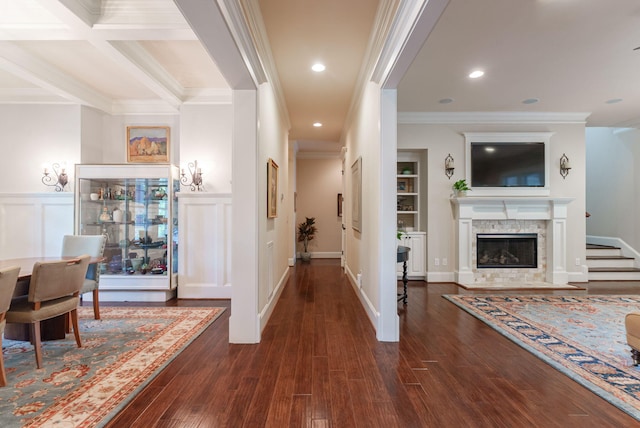 3820 Blue Springs Trce, Evans, GA 30809 - hallway with dark wood-style floors, crown molding, a wainscoted wall, recessed lighting, and a decorative wall