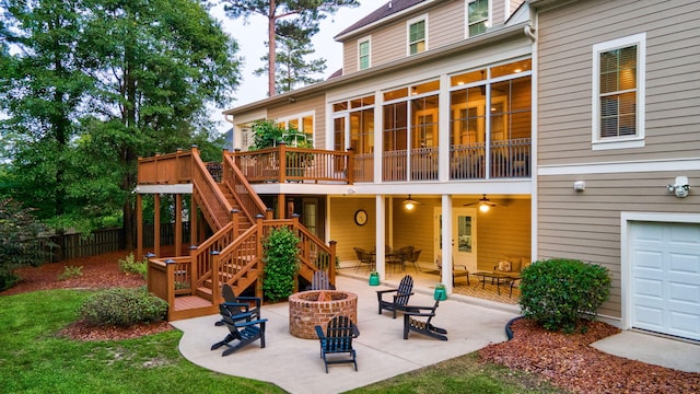 3820 Blue Springs Trce, Evans, GA 30809 - back of property featuring a fire pit, a deck, a patio area, and stairway