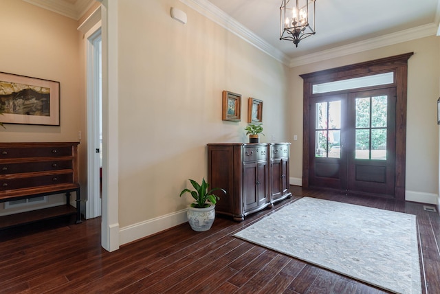 3820 Blue Springs Trce, Evans, GA 30809 - entrance foyer featuring french doors, baseboards, dark wood-style flooring, ornamental molding, and a chandelier