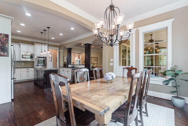3820 Blue Springs Trce, Evans, GA 30809 - dining room featuring decorative columns, a chandelier, dark wood-type flooring, crown molding, and recessed lighting