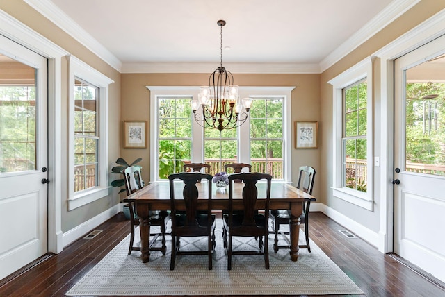 3820 Blue Springs Trce, Evans, GA 30809 - dining area featuring dark wood-style floors, baseboards, a chandelier, and ornamental molding