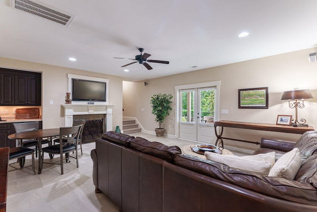 3820 Blue Springs Trce, Evans, GA 30809 - living room featuring a fireplace, a ceiling fan, recessed lighting, stairway, and baseboards
