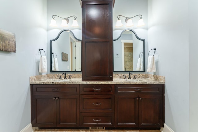 3820 Blue Springs Trce, Evans, GA 30809 - bathroom featuring double vanity and baseboards