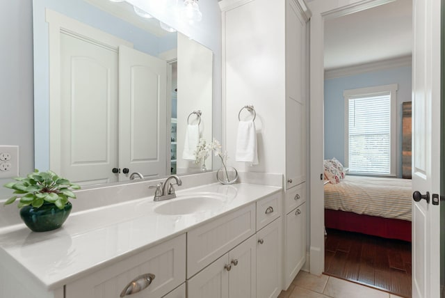 3820 Blue Springs Trce, Evans, GA 30809 - ensuite bathroom featuring vanity, crown molding, and tile patterned flooring