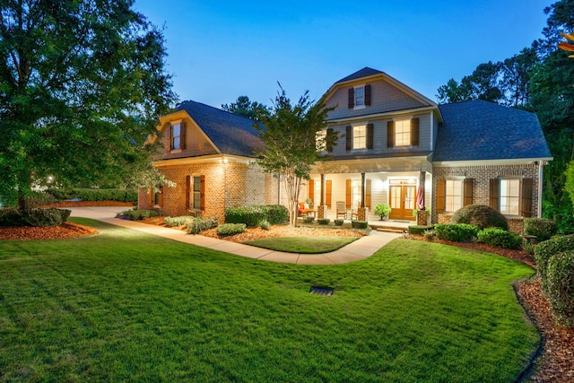 3820 Blue Springs Trce, Evans, GA 30809 - back of property with brick siding, a yard, a porch, and french doors