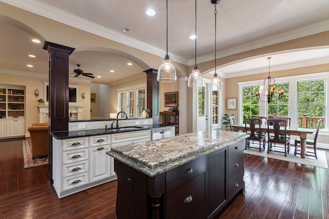 3820 Blue Springs Trce, Evans, GA 30809 - kitchen featuring a sink, ornate columns, arched walkways, a kitchen island, and recessed lighting