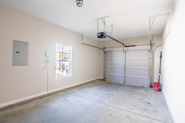 garage featuring electric panel and a garage door opener