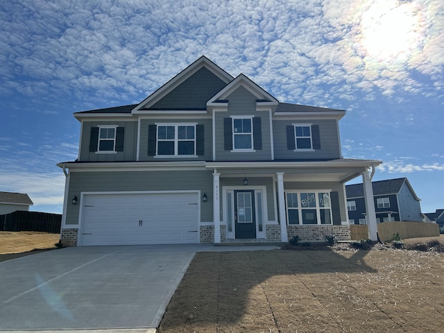 craftsman-style home featuring a porch and a garage