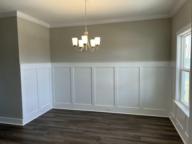 unfurnished dining area with ornamental molding, dark hardwood / wood-style flooring, and a notable chandelier