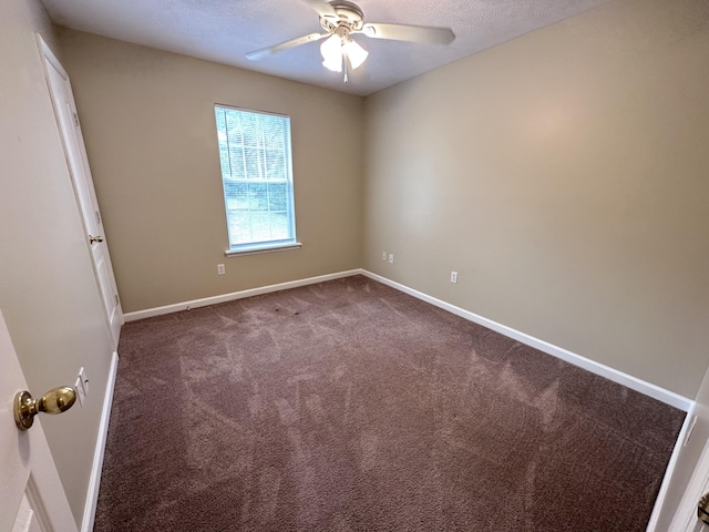 2102 Howard Mill Rd, North Augusta, SC 29841 - empty room featuring dark carpet, a ceiling fan, and a textured ceiling