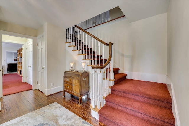 711 Augusta St, Mccormick, SC 29835 - stairway featuring wood finished floors and baseboards
