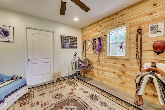 711 Augusta St, Mccormick, SC 29835 - workout room with wooden walls, a ceiling fan, and recessed lighting