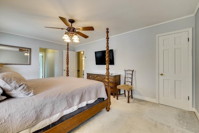 711 Augusta St, Mccormick, SC 29835 - bedroom with light carpet, crown molding, baseboards, and a ceiling fan