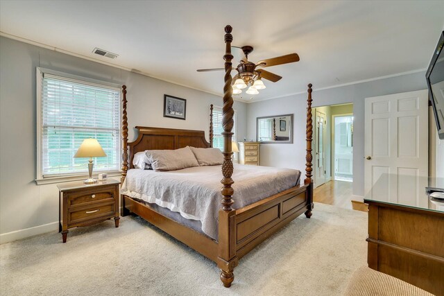 711 Augusta St, Mccormick, SC 29835 - bedroom featuring baseboards, ornamental molding, ceiling fan, and ensuite bathroom