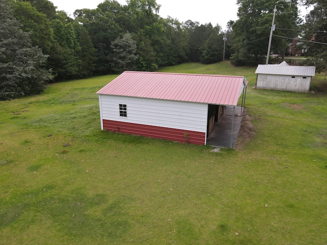 711 Augusta St, Mccormick, SC 29835 - view of pole building with a yard