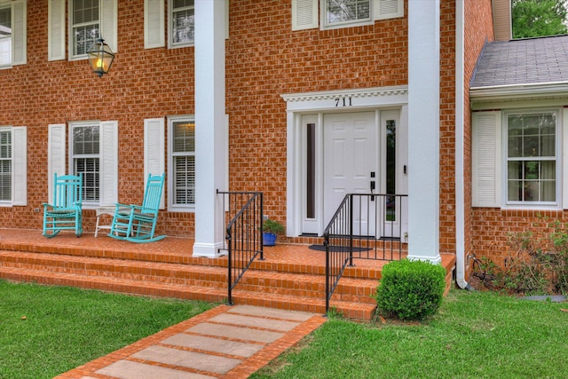 711 Augusta St, Mccormick, SC 29835 - view of exterior entry featuring brick siding