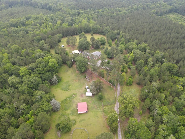 711 Augusta St, Mccormick, SC 29835 - aerial view of property and surrounding area featuring a heavily wooded area