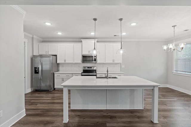 2318 Laurens St, Grovetown, GA 30813 - kitchen featuring appliances with stainless steel finishes, baseboards, ornamental molding, a sink, and tasteful backsplash